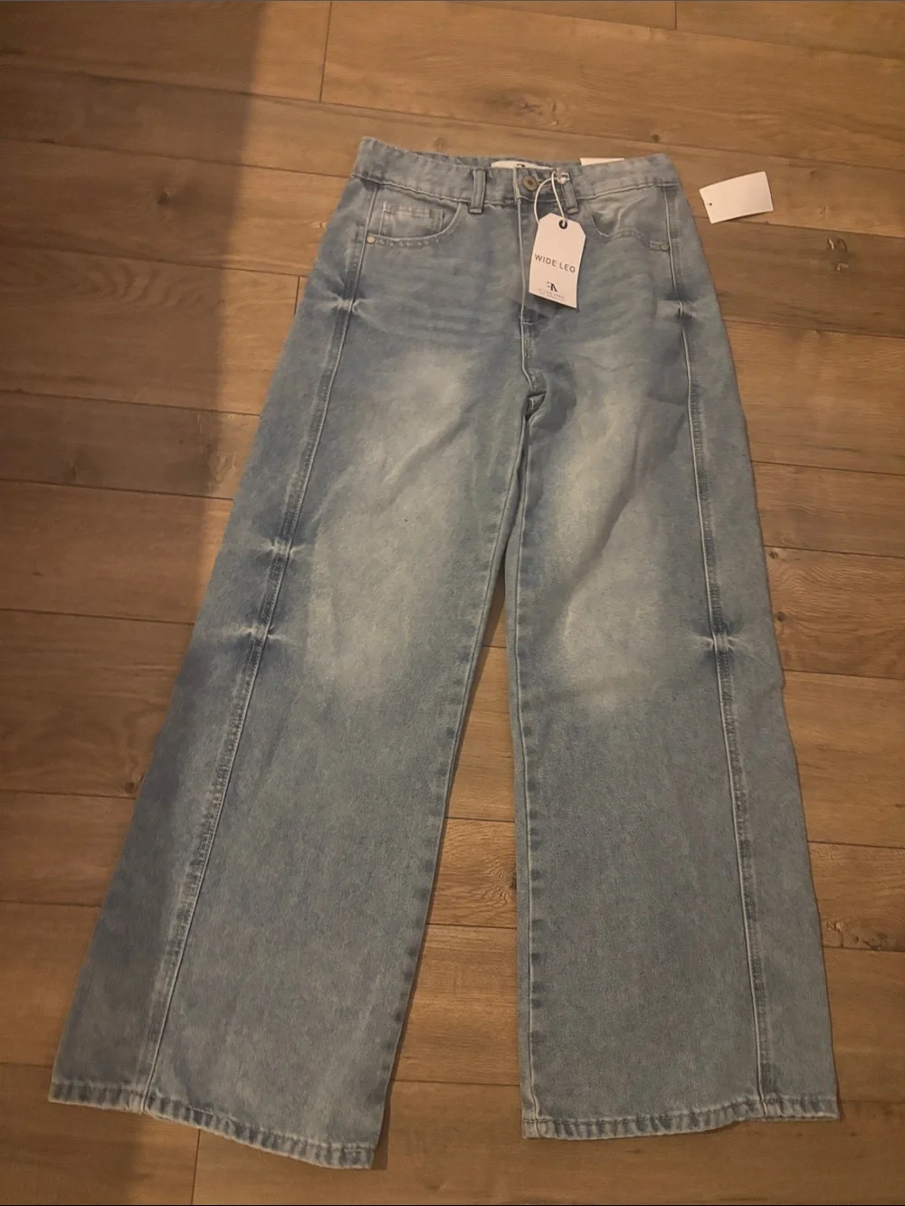 Flying Angel High-Rise Wide Leg Jeans in Light Blue